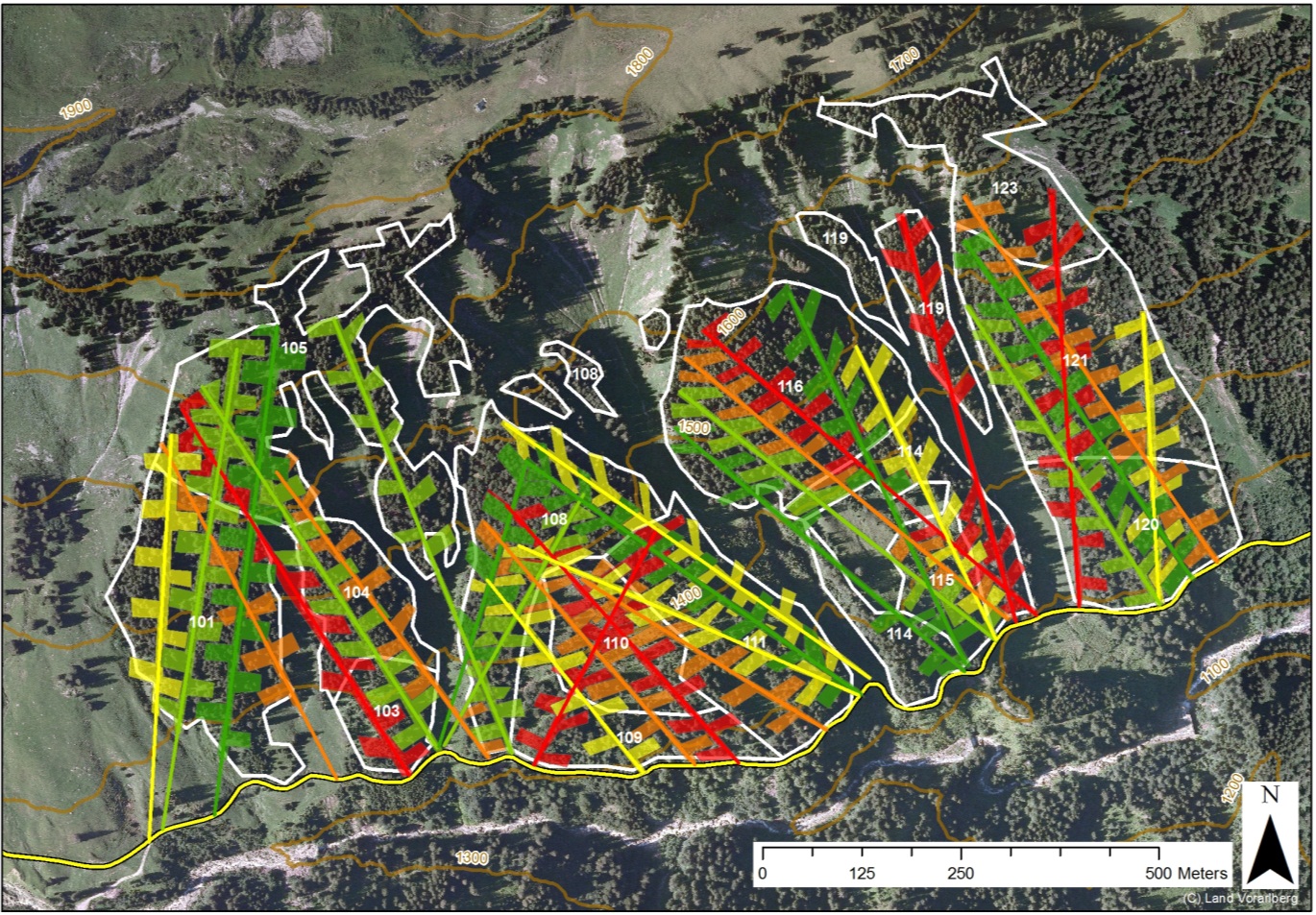 Figure MO-4: Fishbone shaped slit cuts as proposed as an adaptation measure planned over 100 years for a forest compartment of ca. 70 ha. The colors of the slits cuts and skyline tracks indicate 20 year time periods from green to red (from 2010 to 2110). The stands are displayed in white and the road at the bottom of the slope in yellow. This approach results in a faster turnover of tree generations by 20%.